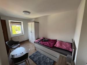 Ένα ή περισσότερα κρεβάτια σε δωμάτιο στο Pure Stay Ferienwohnung in Forst