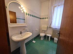 Ένα μπάνιο στο Villa Mazzon Family Apartments