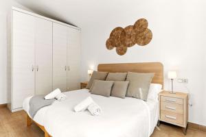 Ένα ή περισσότερα κρεβάτια σε δωμάτιο στο Can Alvaro