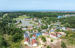 an aerial view of a resort with a lake at Village Pierre & Vacances Belle Dune in Fort-Mahon-Plage