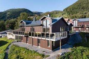 an aerial view of a house with a balcony at Åre Travel - Holiday Village in Åre