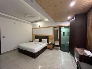 Voodi või voodid majutusasutuse sunita resort toas