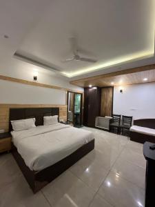 Voodi või voodid majutusasutuse sunita resort toas