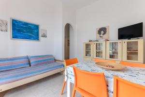 Μια τηλεόραση ή/και κέντρο ψυχαγωγίας στο Terrazza Sulla Baia Marina di Campo