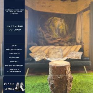 a poster of a bed with a tree stump at La Tanière du loup in Le Mans