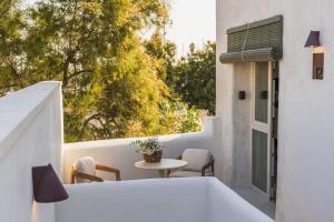 a view from the balcony of a house with a table and chairs at Vacança beach in Denia