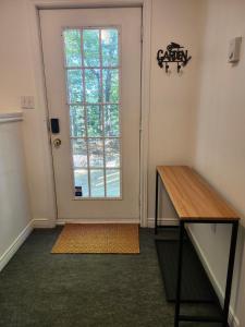 a room with a door and a table and a window at 12 Royal Masts Way in Halifax