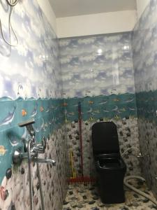 Koupelna v ubytování Naayuma Homestay