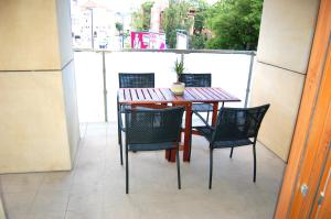 Balkón nebo terasa v ubytování Quattro Loft Hostel