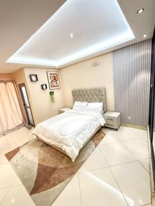 מיטה או מיטות בחדר ב-Mon chez moi