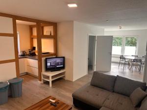 Dapur atau dapur kecil di 3 Schlafzimmer Wohnung für 6 Personen in Wörrstadt inkl Terrasse & Garten