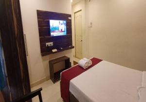 TV a/nebo společenská místnost v ubytování MM Park Inn