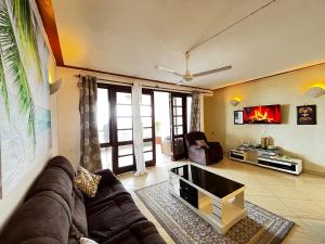Posezení v ubytování Jinco Beachfront Apartment's
