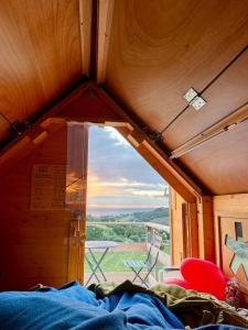 a view from the inside of a room with a window at Potenza Picena StarsBox Orto del Marinaio in Potenza Picena