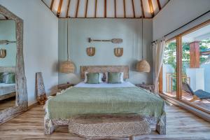 Katil atau katil-katil dalam bilik di Noho Stay Bali