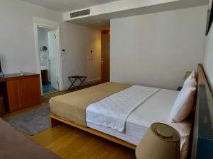 Ένα ή περισσότερα κρεβάτια σε δωμάτιο στο Misafir Suites 8 Istanbul