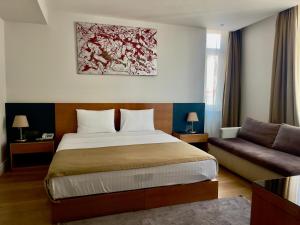 Ένα ή περισσότερα κρεβάτια σε δωμάτιο στο Misafir Suites 8 Istanbul