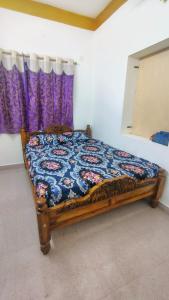 Postel nebo postele na pokoji v ubytování UmaNatarajan Residency + 37 fotografií