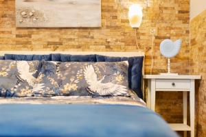 Ένα ή περισσότερα κρεβάτια σε δωμάτιο στο Plus Romance +17 φωτογραφίες