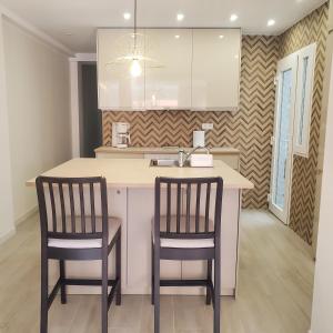 Kuchyň nebo kuchyňský kout v ubytování Stay in Torrevieja Comfortable Sea & Sand
