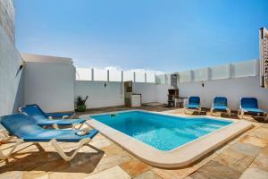 Πισίνα στο ή κοντά στο Preciosa Casa En Lanzarote