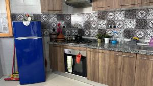 Η κουζίνα ή μικρή κουζίνα στο Joli appartement Casablanca ain sebaa