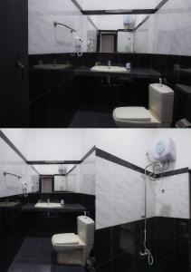 a bathroom with two toilets and two sinks at Pineapple Hills Ella in Ella