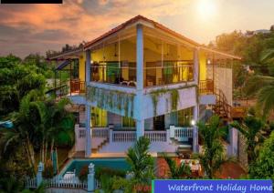 an aerial view of a house at Waterfront Villa By Bigfoot Stay in Chouk