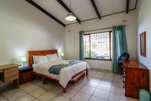 Postel nebo postele na pokoji v ubytování A Stroll to the beach + 9 fotografií