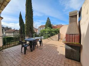 Balkón nebo terasa v ubytování La Plasse, appartement familial au centre de Roanne