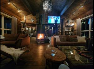 Χώρος καθιστικού στο Saana Aurora Panorama Lodge