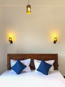 Voodi või voodid majutusasutuse Golden Nest toas