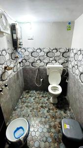 Un baño de Raghu Homestay Hampi