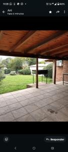 a picture of a park with a bench in a pavilion at Pao Pei in Santa Rosa de Calamuchita
