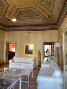 Ένα ή περισσότερα κρεβάτια σε δωμάτιο στο Casa Caterina