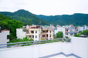 a view of a city from the roof of a building at Bright & Cozy 2BHK, Peaceful Stay Close To Thamel & Swayambhu in Kathmandu