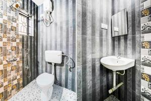 Un baño de Hotel O Baga Beach Formerly Symphony Homes