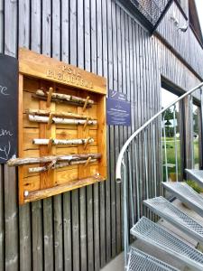 a wooden box on the side of a building at Moje Miejsce Jura in Lgota Murowana