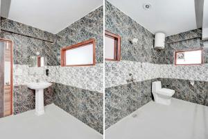 a bathroom with a toilet and a sink at Hotel O Sector 20 Noida in Noida