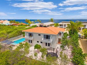 Bazén v ubytování Villa Pasando - Luxe familievilla nebo v jeho okolí