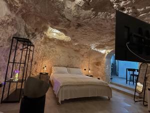 Giường trong phòng chung tại La Quattordici Luxury Apartment