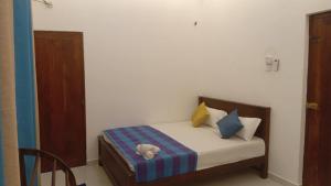 Postel nebo postele na pokoji v ubytování Villa 307A