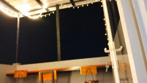 a window in a room with orange chairs at Villa D'Shanon Batu in Tlekung