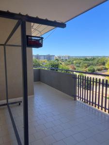 a balcony with a view of the city at Green House in Monopoli