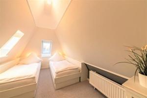 Voodi või voodid majutusasutuse Strandgut OG toas