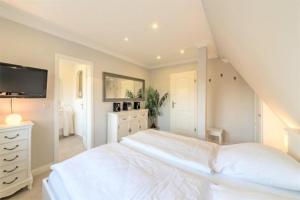 Voodi või voodid majutusasutuse Strandgut OG toas