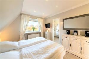 Voodi või voodid majutusasutuse Strandgut OG toas