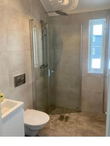 a bathroom with a shower and a toilet and a sink at Sälen Vintergatan 744 Lindvallen in Sälen