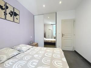 Postel nebo postele na pokoji v ubytování Le Blum - Appartement avec terrasse - Climatisation et Wifi