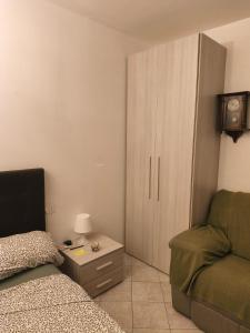 Ένα ή περισσότερα κρεβάτια σε δωμάτιο στο Humanitas, IEO, Forum Assago, Rozzano